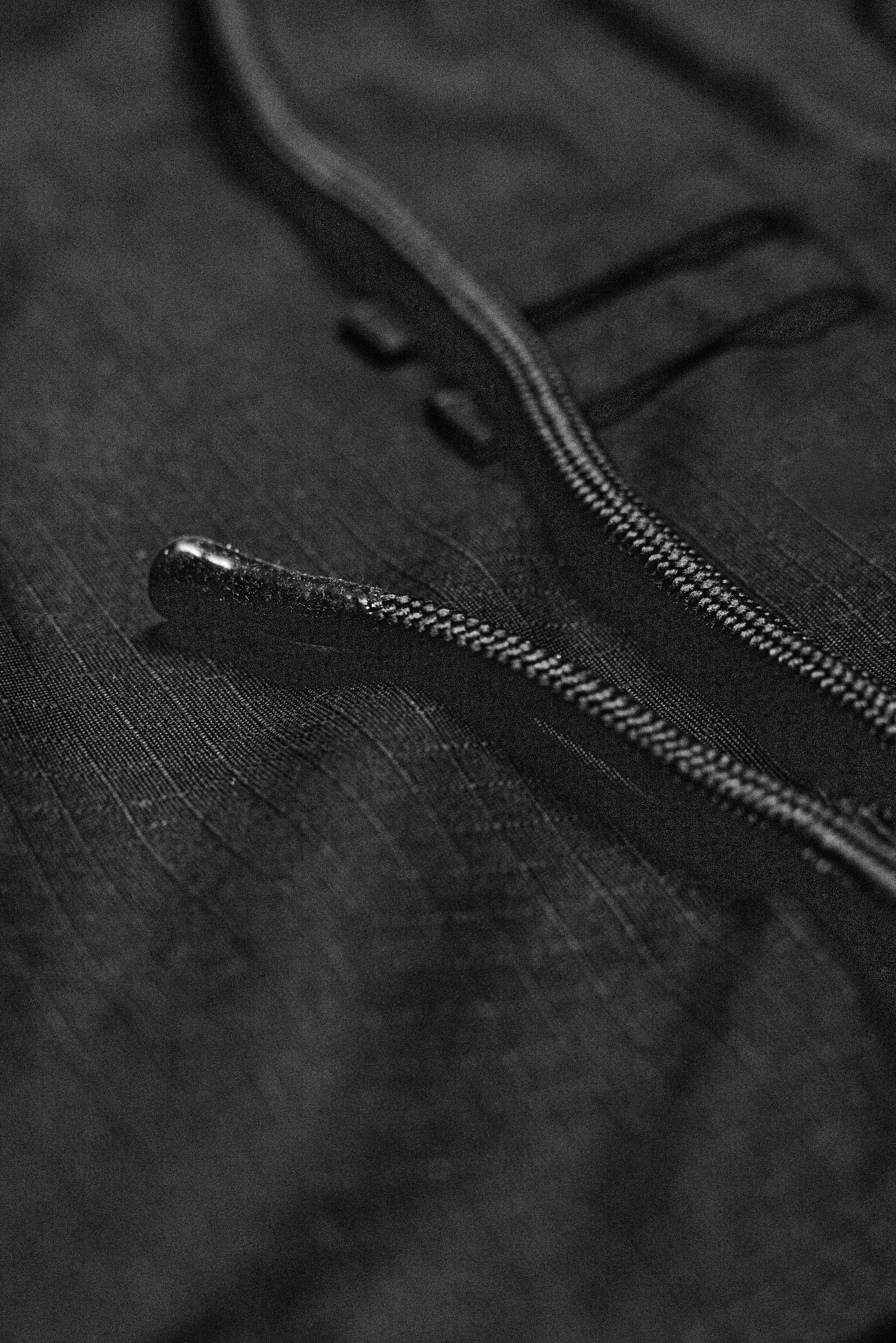 Flat-lay drawstring and gusset detail on black SBR Comp Lite Gi pants