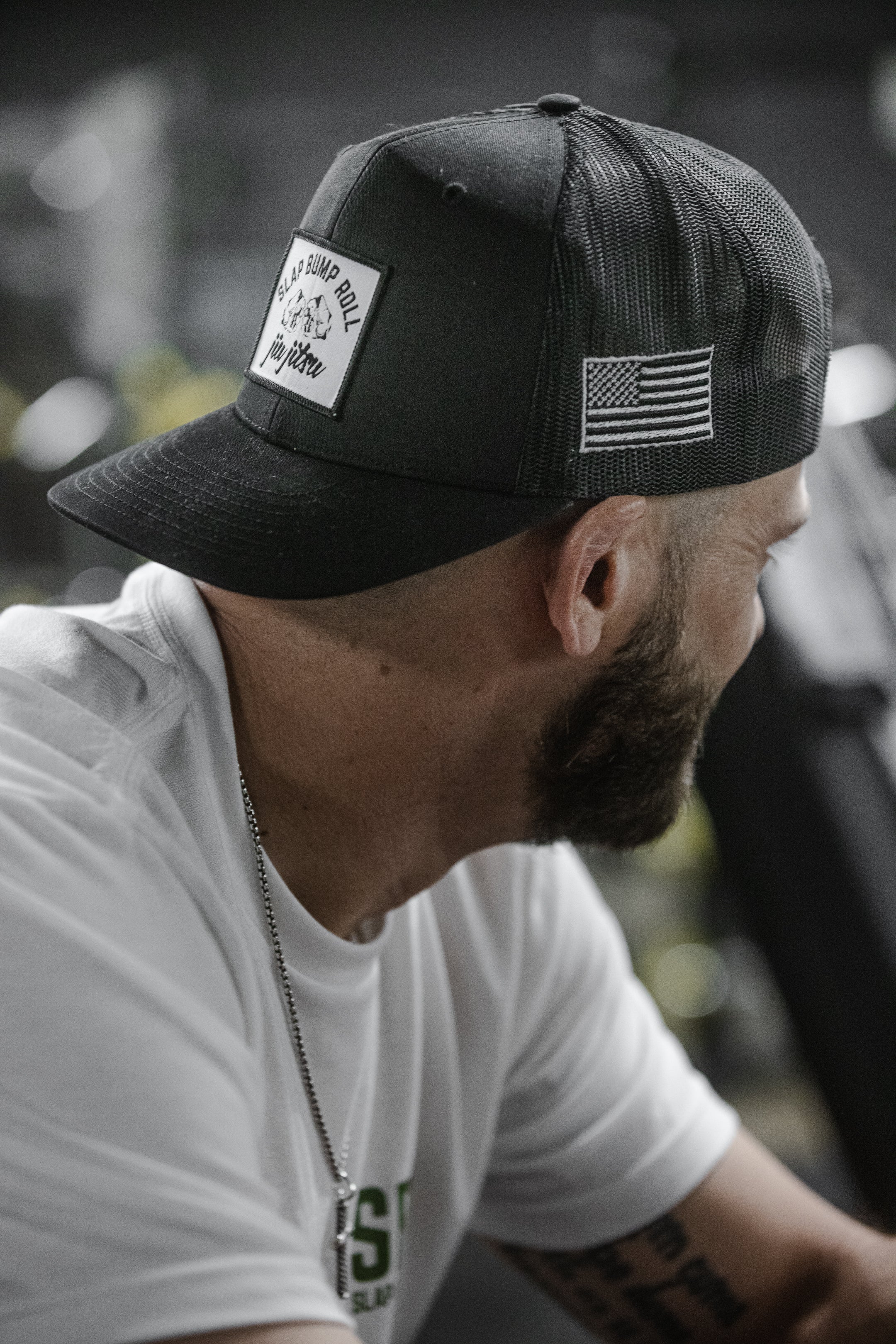 Athlete wearing SBR Jiu Jitsu Trucker Hat at the gym, BJJ lifestyle headwear